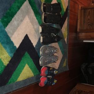 Four pairs of Nike size 13 little boys shoes